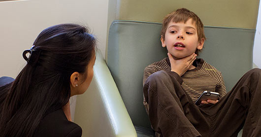 child talking to doctor