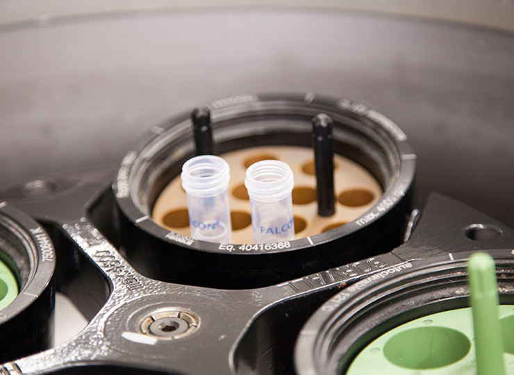 image of lab centrifuge with tubes in preparation