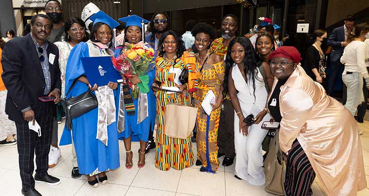 group shot of graduates with their family