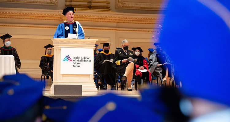 James S. Tisch at the podium during commencement ceremony