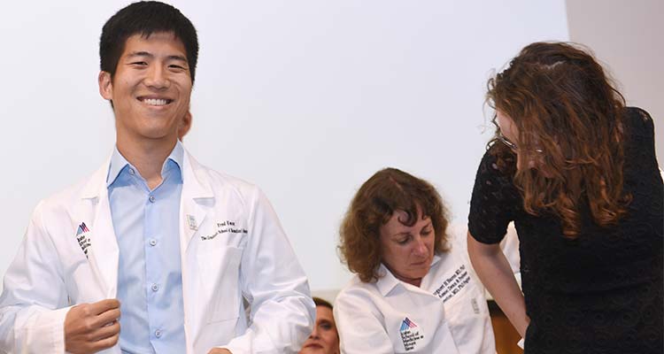 Students are given white coats