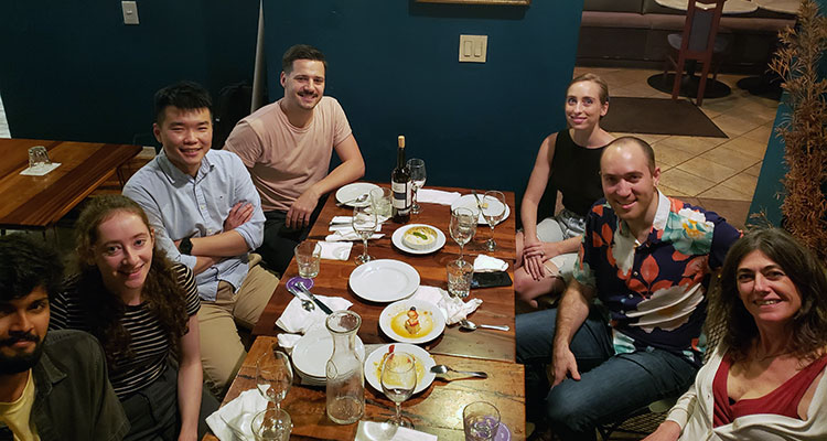image of team at a dinner table